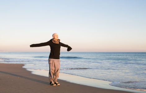 Real Female hairless fight against cancer at the beach